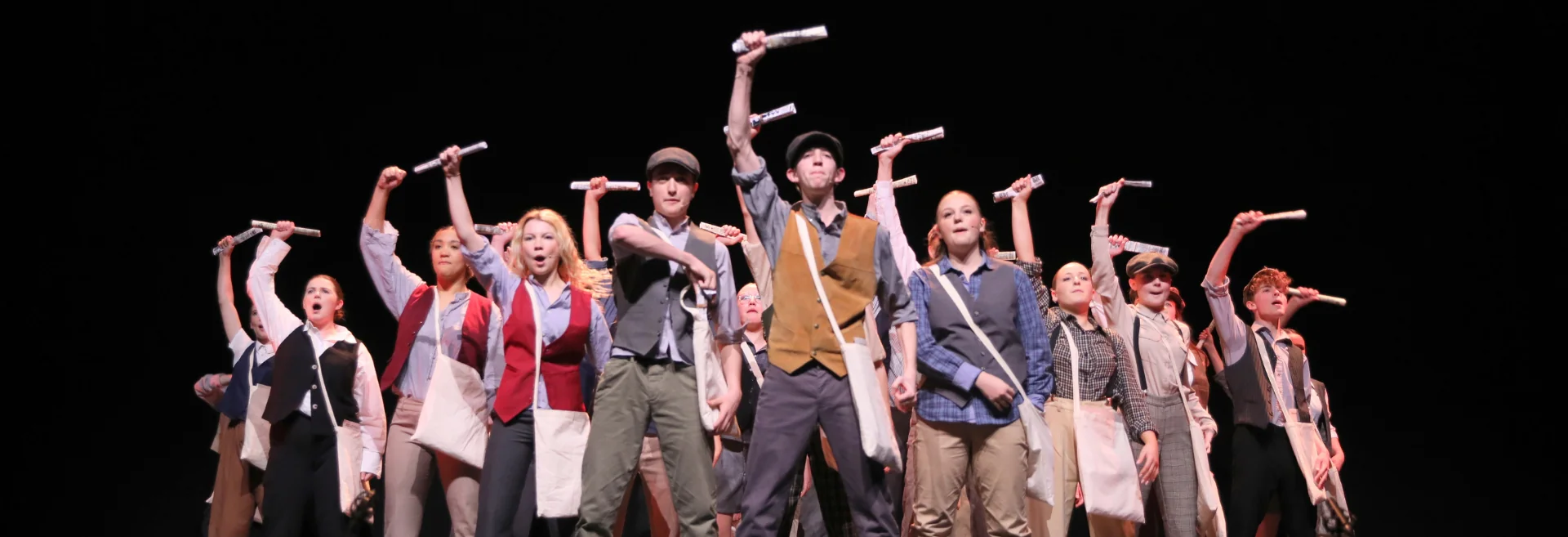 Students from Razzamataz Weymouth on stage in April 2024 at the Shaftesbury Theatre in London's West End